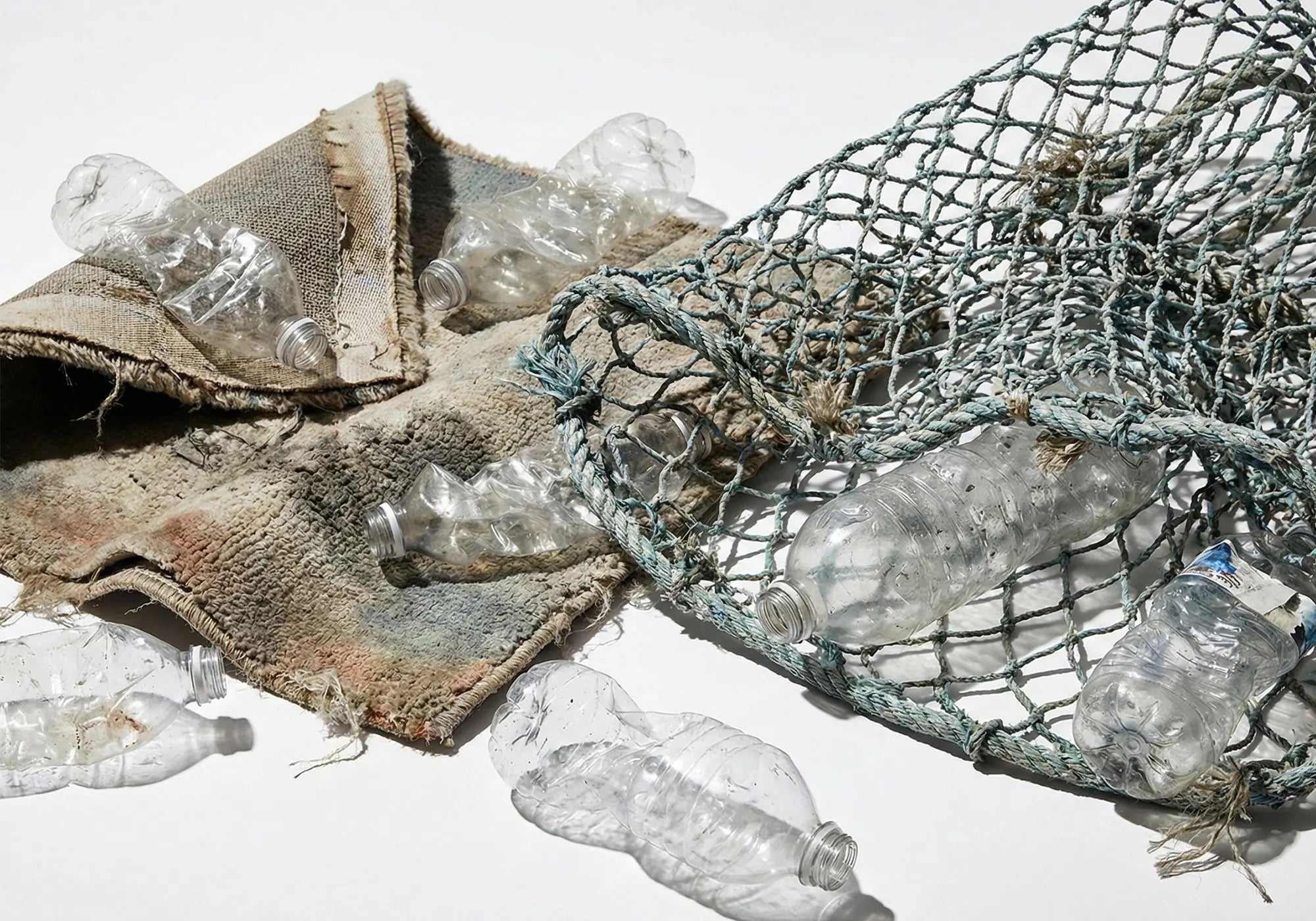 Recycled marine waste used for REPREVE canvas production, transparency macro documenting material origin.